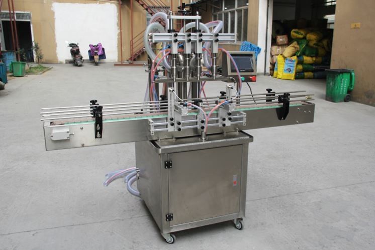 Nuevo diseño de aceite semiautomático / jugo / agua / miel vidrio líquido puede botella de plástico llenando maquina de embalaje