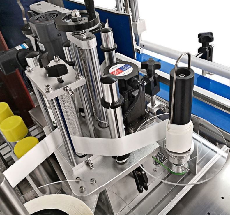 El precio más bajo y la venta caliente máquina de etiquetado automática de mesa para botellas redondas