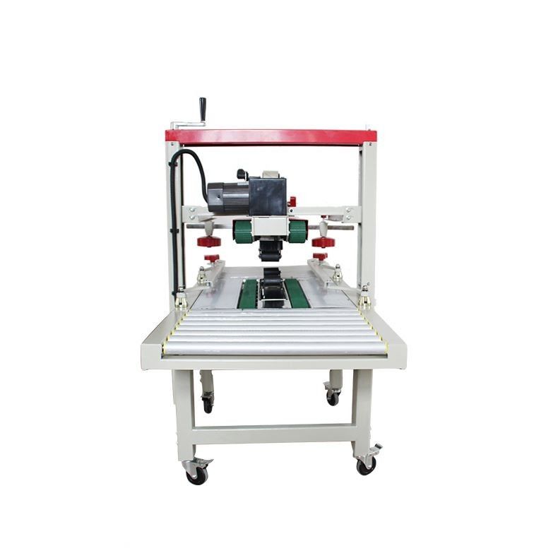 Fxj-6050 Alta velocidad ajustable cinta superior inferior eléctrica estable cajas de cartón automáticas cajas sellador de caja máquina de sellado de cartón