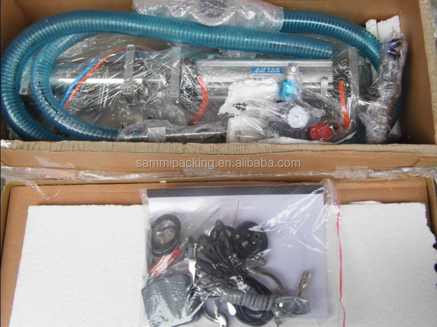 Máquina de llenado horizontal de autoaspiración de 100-1000 ml, relleno de líquido de pistón manual en la mesa