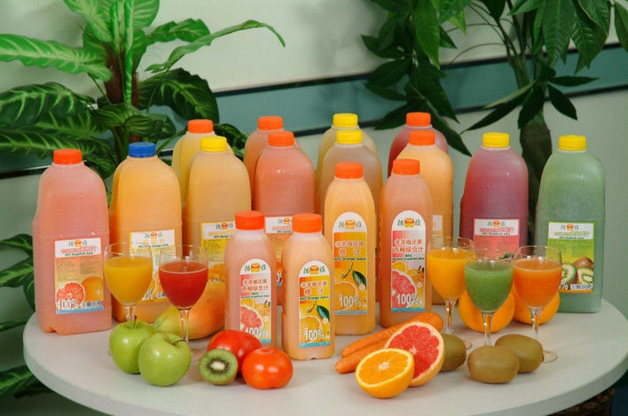 Máquina de llenado automático caliente para botellas de vidrio Máquina de llenado de jugo a pequeña escala Botella de bebidas para mascotas Máquina de llenado de líquido