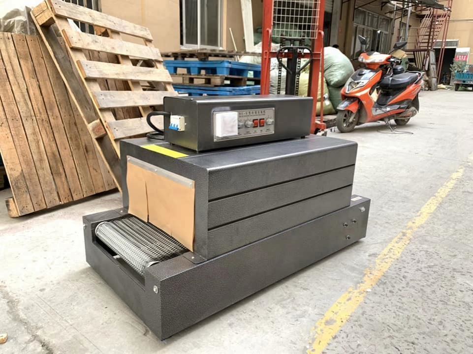 Máquina de embalaje retráctil por túnel de calor de película plástica pequeña en oferta para botellas/cajas, fácil de operar